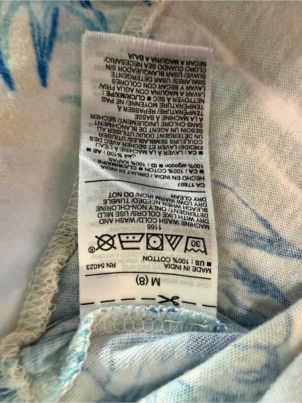 Old Navy Girl’s Cream and Blue Tropical Floral Tee- Medium